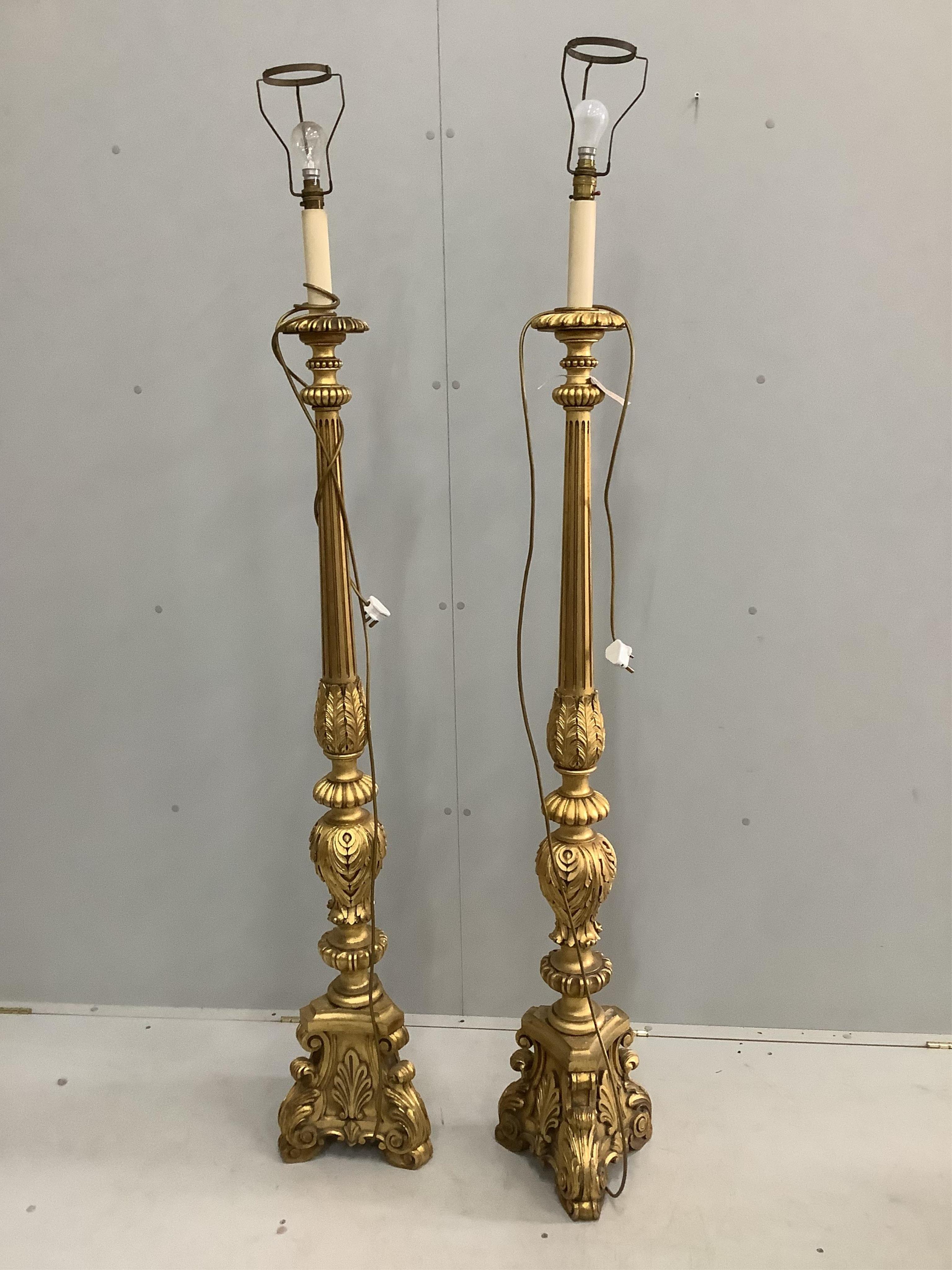 A pair of 18th century style giltwood standard lamps, height including shades 190cm. Condition - good